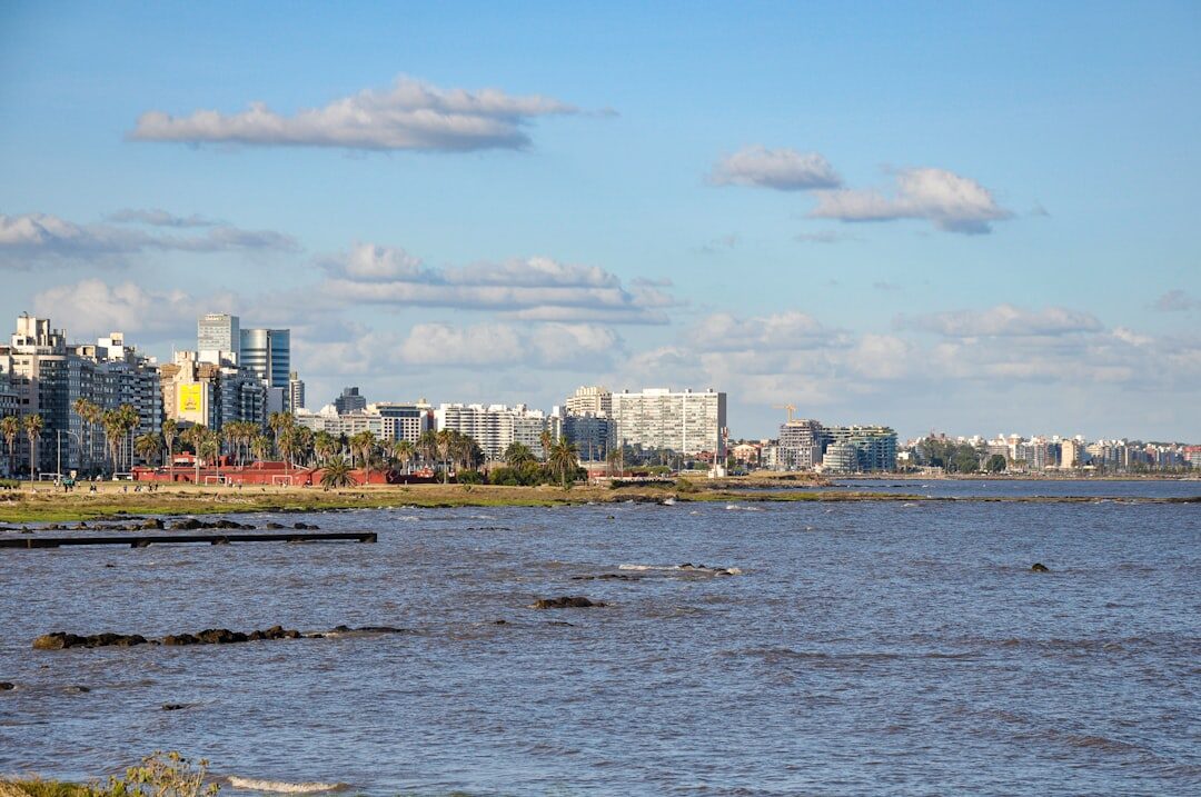 Skyline of Montevideo at sunset with the coastline visible